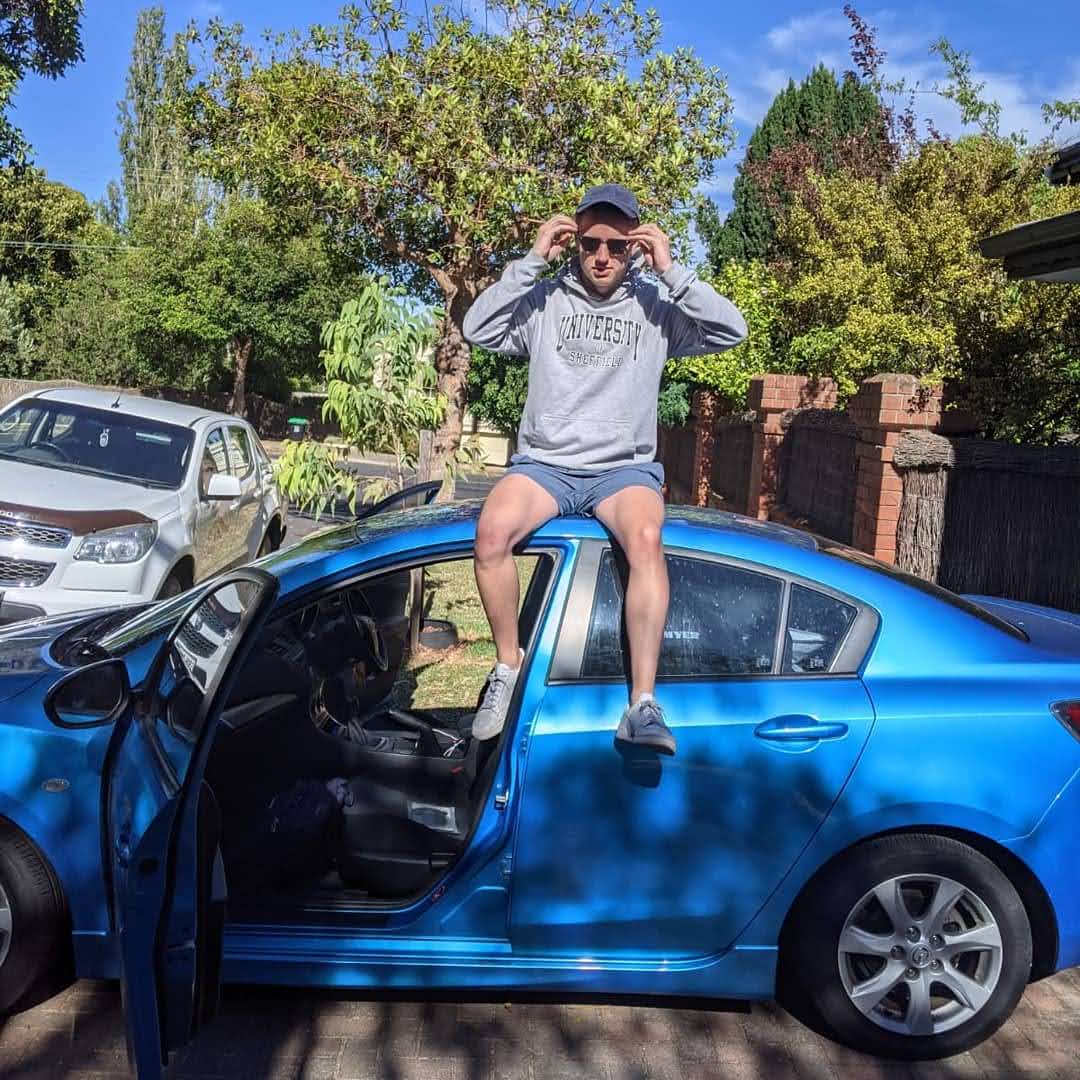 Me sitting on my car before we head off - 31st of Jan